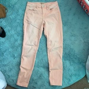 faded pink stretchy skinny jeans-